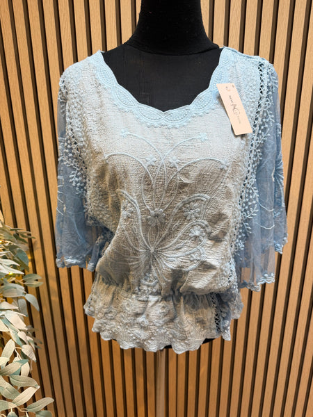 Embroidered top with angel sleeves