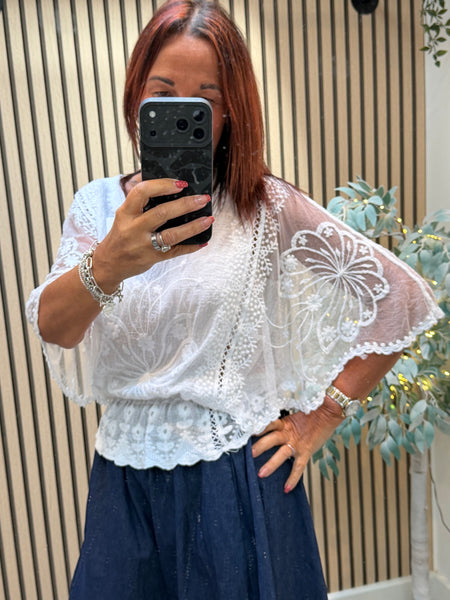 Embroidered top with angel sleeves