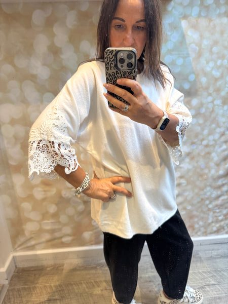 Soft knit jumper with lace sleeves