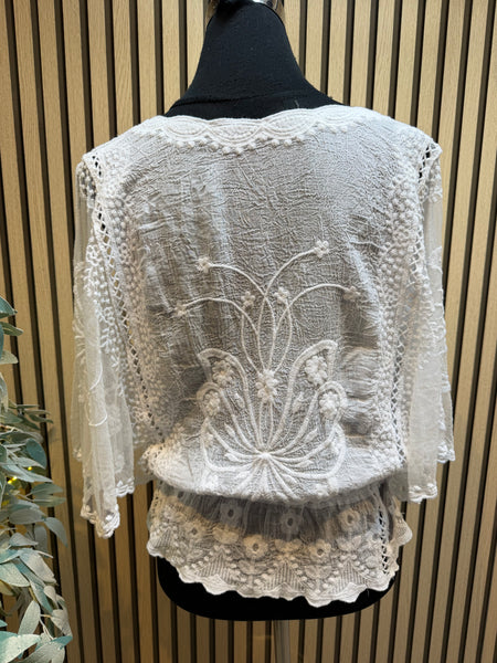 Embroidered top with angel sleeves