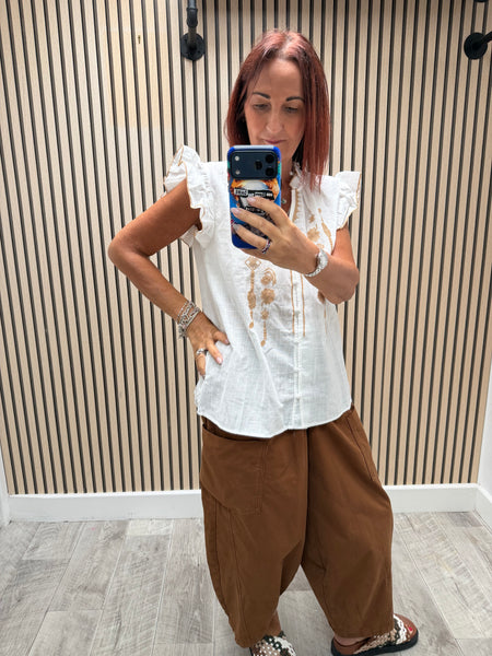 Embroidered front frill blouse