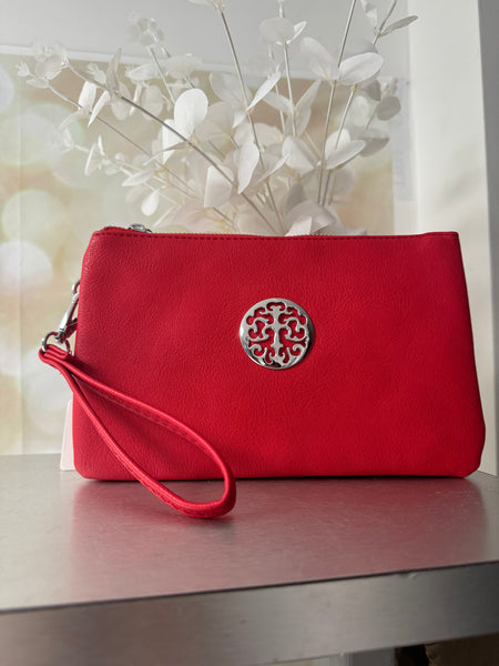 Clutch bag with cross body strap
