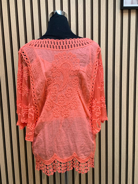Embroidered top with lace sleeves